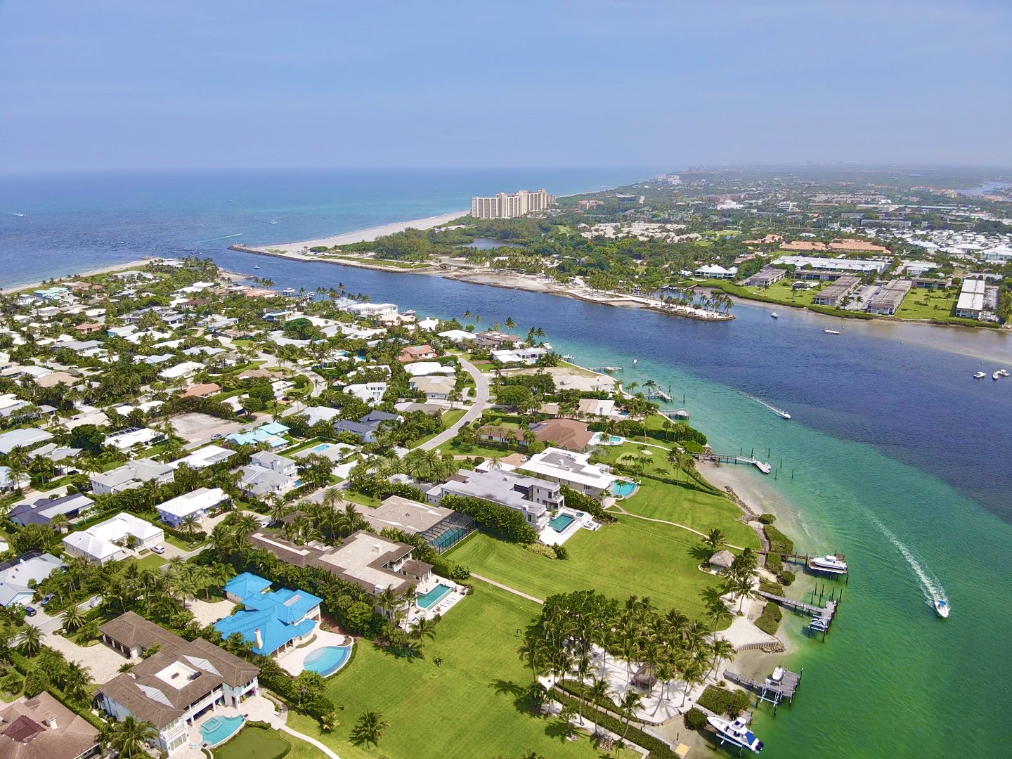 Aerial view of South Florida waterfront homes — Intracoastal canals and dockable single-family inventory we represent buyers in.